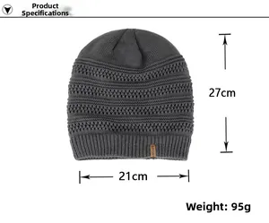 Detail view of dark gray knit beanie with Sport leather patch and size measurement indicators
