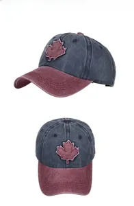 Detail of washed cotton baseball cap with maple leaf patch and Canada side embroidery