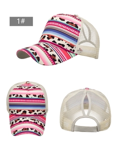 Three views of a ponytail hole baseball cap with floral print and mesh back panels