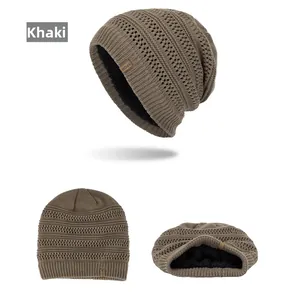 Detail showing the khaki knitted hat with thick black fleece lining and SPORT leather patch