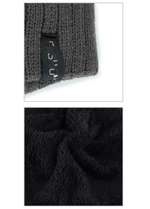 Detail of grey ribbed knit beanie with soft black fleece lining and Fashion label