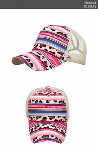 Detail view of colorful mesh ponytail baseball cap with leopard print and stripes
