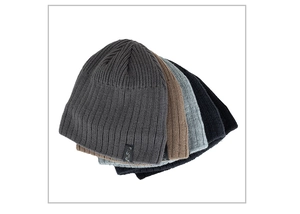 Close-up of ribbed knit beanies in multiple colors featuring a black Fashion side label