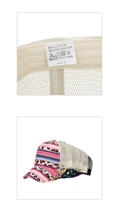 Detail of fabric labels showing 65% cotton content on a floral mesh ponytail baseball cap