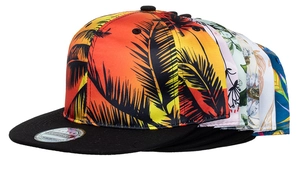 Detail showing various snapback hats with colorful tropical palm tree and floral prints