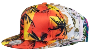 Detail of snapback caps with palm tree prints and silver laser labels on the brim