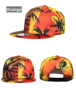 Detail view of tropical sunset gradient snapback hat with black palm tree patterns