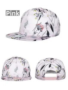 Pink snapback cap with tropical floral print and adjustable closure detailed view