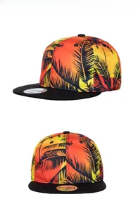 Detail view of tropical palm tree digital print on snapback cap with flat black brim