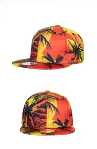 Detail view of snapback hat with orange gradient and black palm tree silhouette print
