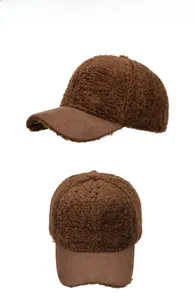 Detailed view of brown teddy fleece baseball cap with contrast brim texture