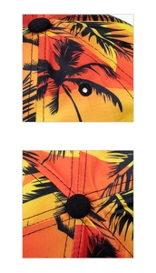 Detail of tropical palm tree print on hip hop cap with orange gradient and stitching