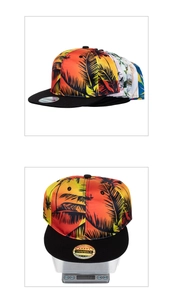 Macro view of snapback hat weight on digital scale featuring tropical palm tree print