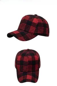 Detailed view of the red and black buffalo plaid patterns on the classic baseball cap