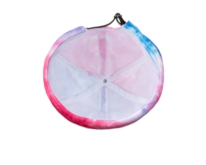 Detail view of tie-dye miki hat showing inner stitching and adjustable metal buckle strap