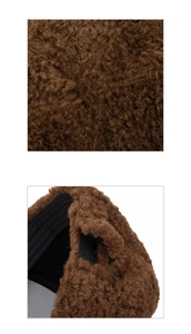Detailed view of dark brown sherpa fabric texture and thick black stitched lining on cap