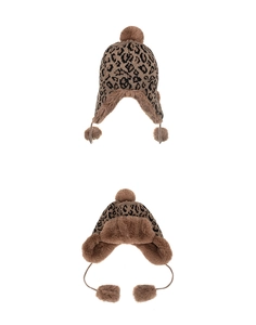 Detail of warm leopard print knit trapper hat with thick brown faux fur lining