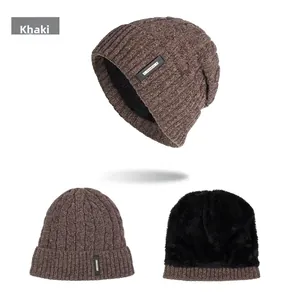 Close-up of khaki cable knit beanie with thick fleece lining and fashion leather label