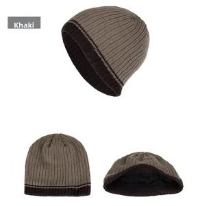 Detail view of khaki striped knit beanie showing thick black fleece lining for winter warmth