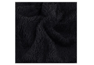 Close-up of soft black faux fur texture on a ribbed knit long beanie hat