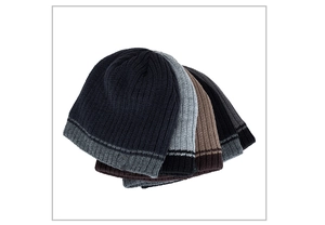 Close-up of ribbed knit beanie hats in multiple colors with striped edge details