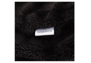 Detail shot of the black 100% acrylic lining and care label of this knit beanie