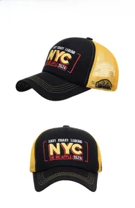 Detail view of NYC embroidered baseball cap with yellow mesh panels and curved brim