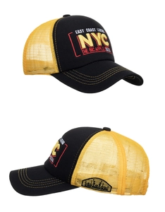 Detail of NYC 3D embroidery on black and yellow mesh trucker hat with curved brim