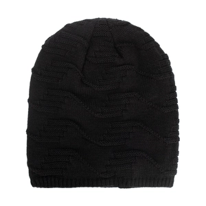 Thick black knitted beanie for women featuring a 3D wave texture and ribbed cuff design