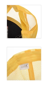 Detail of yellow trucker hat featuring plastic snapback closure and 100% cotton wash label