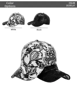 Detail view of ink floral pattern printed baseball cap in black and white color options