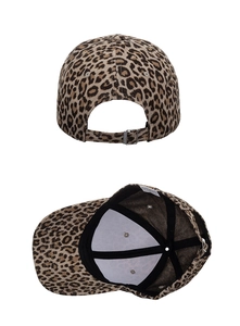 Detail of adjustable metal buckle and internal structure on leopard print baseball cap