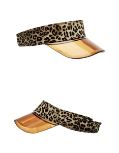 Detail view of leopard print sun visor with amber translucent plastic brim and fabric texture