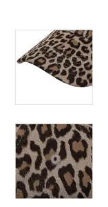 Close-up of leopard print baseball cap featuring metallic thread and detailed stitching