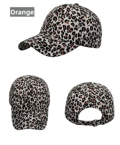 Detail view of leopard print baseball cap with adjustable metal buckle and six-panel design