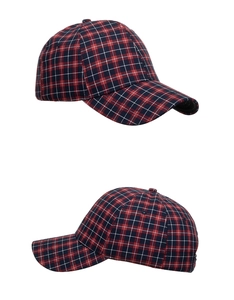 Close-up of red and blue plaid baseball cap with classic six-panel design and curved brim