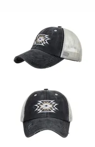 Detail of vintage washed baseball cap with Aztec embroidery and breathable mesh back