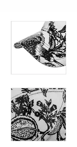 Macro detail of Chinese ink painting floral print on textured fabric of the baseball cap