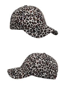 Detailed view of the six-panel structure and leopard print texture on the baseball cap