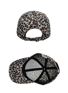 Detail view of leopard print baseball cap featuring silver metal buckle and inner tape