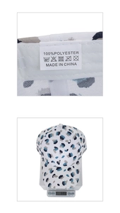 Detailed tag showing 100% polyester material and digital scale weighing at 68.6g