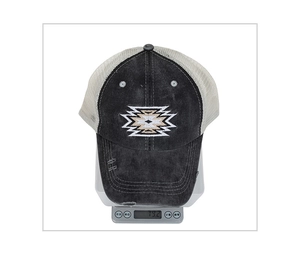 Detailed view of the lightweight washed denim baseball cap on a digital scale weighing 79.2g