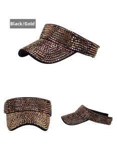 Detail of sun visor hat with sparkling rhinestones and gold studs in black and gold