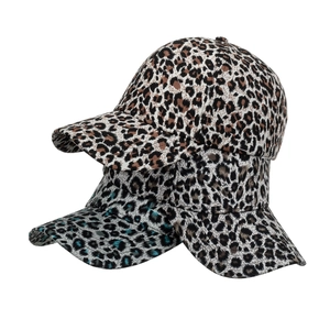 Three leopard print baseball caps in various colors with a curved brim design for outdoor use