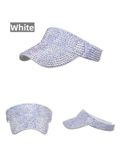 Detailed view of a white sun visor hat with multi-colored rhinestones from three angles