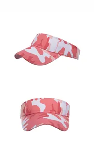 Detail of pink camo print visor hat with wide brim for golf and tennis sports