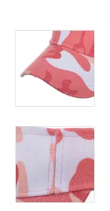 Detailed close-up of pink and white camouflage twill fabric and stitching on visor cap