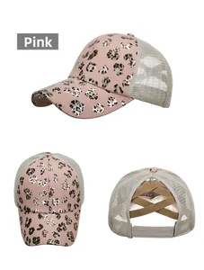 Detail view of pink leopard print ponytail baseball cap with mesh back and criss cross bands