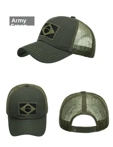 Detail view showing army green trucker hat with mesh back and adjustable strap