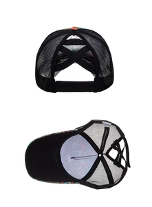 Detail view of breathable mesh back and elastic ponytail hole on floral baseball cap